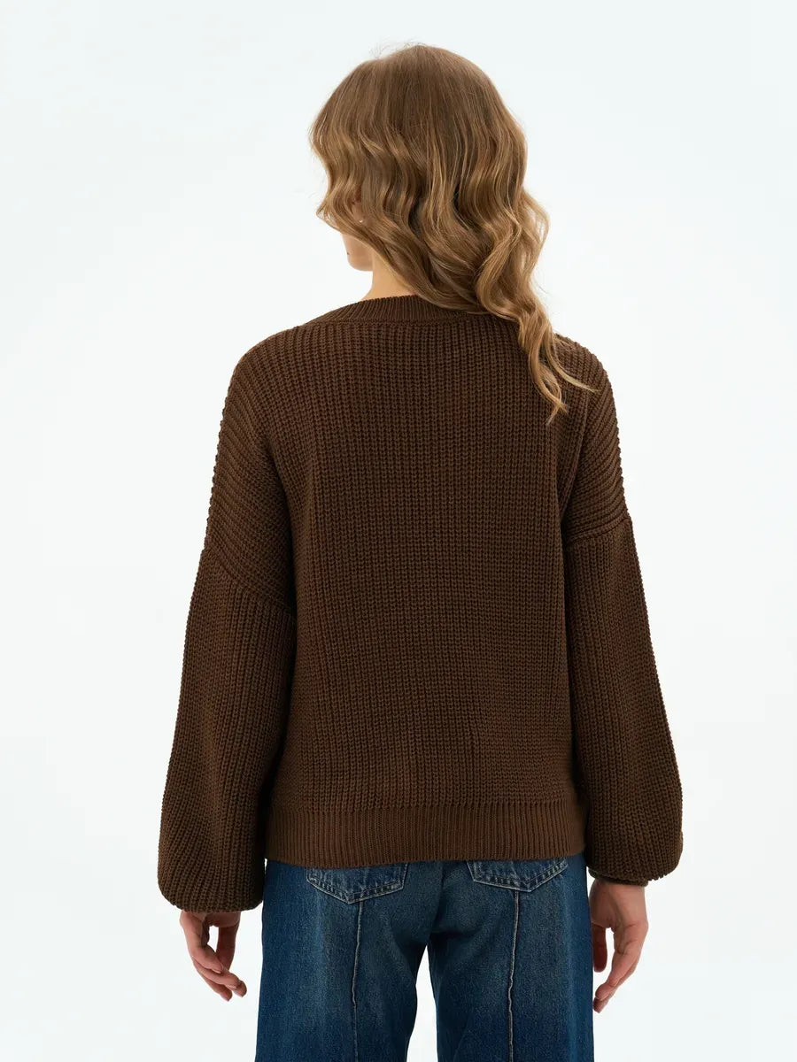 Back view of Orion Sweater in chocolate brown oversized knitwear from Lauven, showcasing its cozy style.