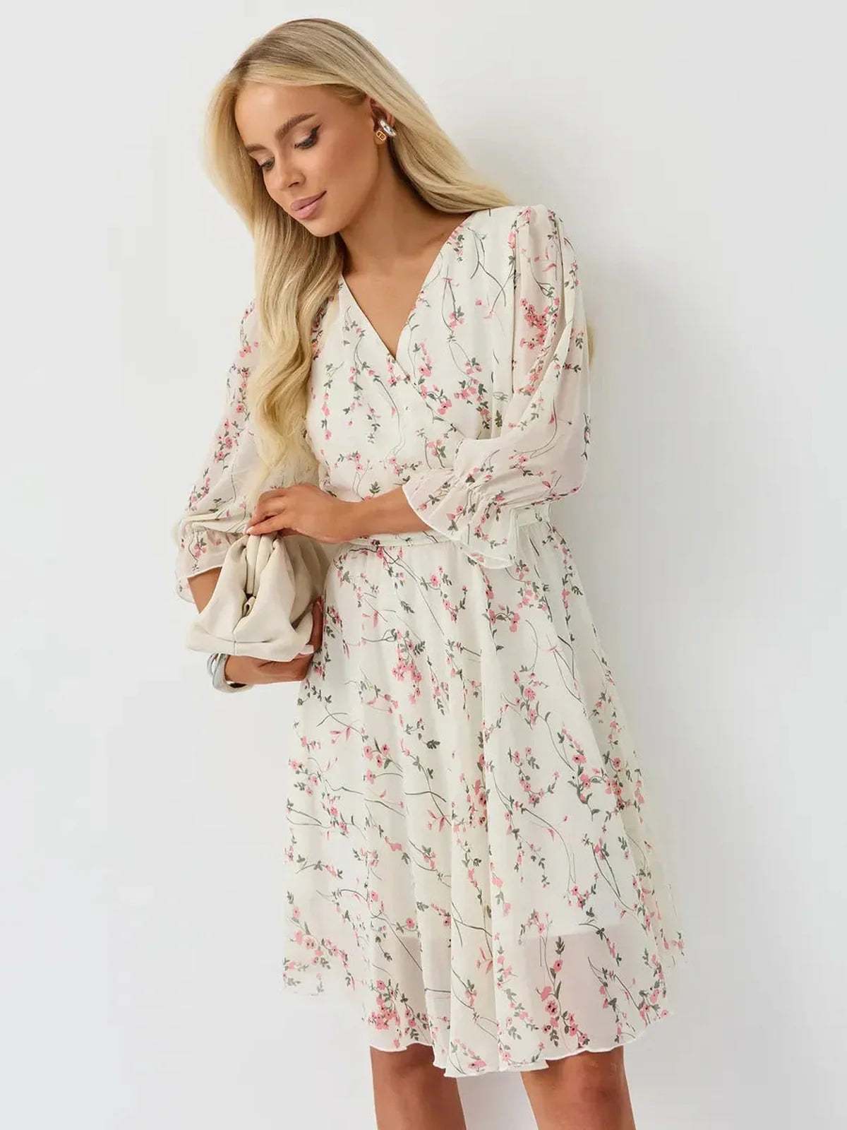Petunia Mini Dress by Lauven - White floral wrap dress with V-neckline and three-quarter sleeves.