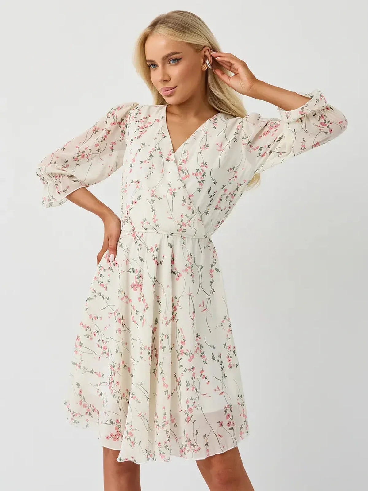 Petunia Mini Dress by Lauven - White floral wrap dress with A-line silhouette and V-neckline.