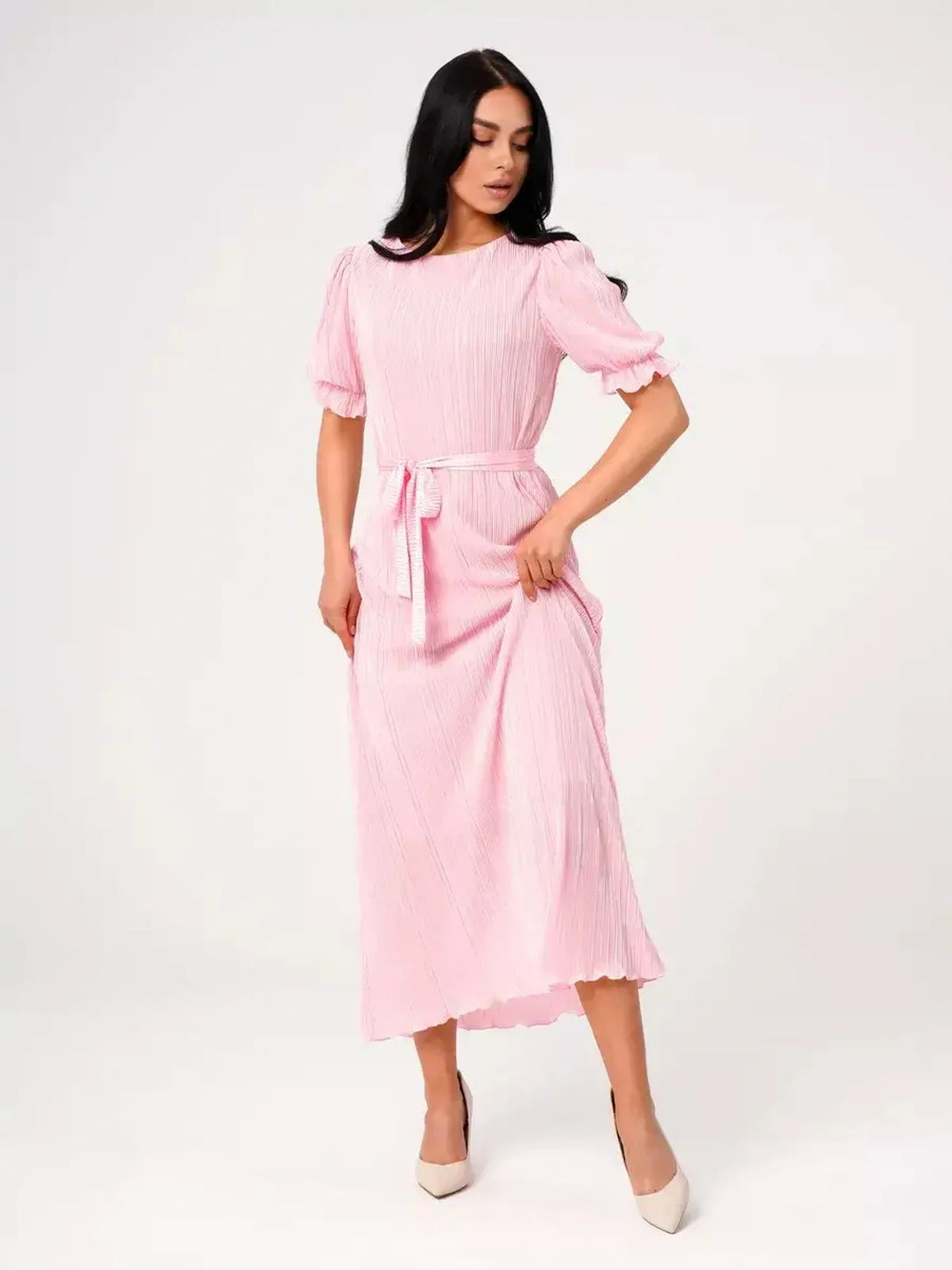Candy Maxi Dress featuring pleated elegance, puff sleeves, and a tie waist in a soft pink color.