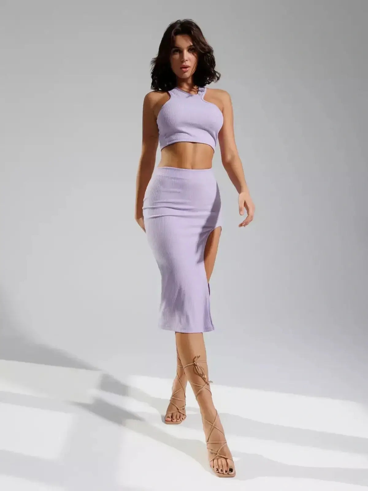 Piper Cutout Set by Lauven - Lilac ribbed knit two-piece with asymmetric crop top and thigh-high side slit skirt.