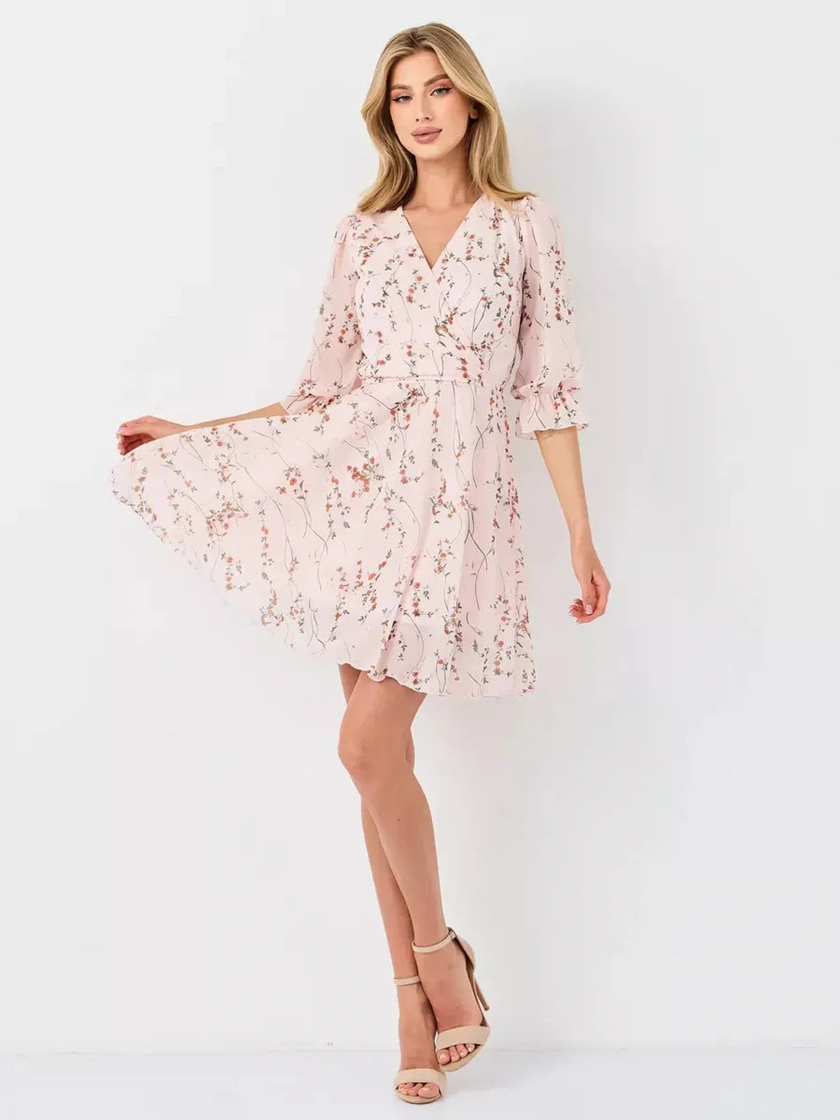 Primrose Mini Dress by Lauven - Pink floral wrap dress featuring A-line silhouette and 3/4 puff sleeves.