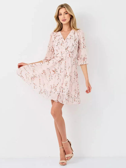 Primrose Mini Dress by Lauven - Pink floral wrap dress featuring A-line silhouette and 3/4 puff sleeves.