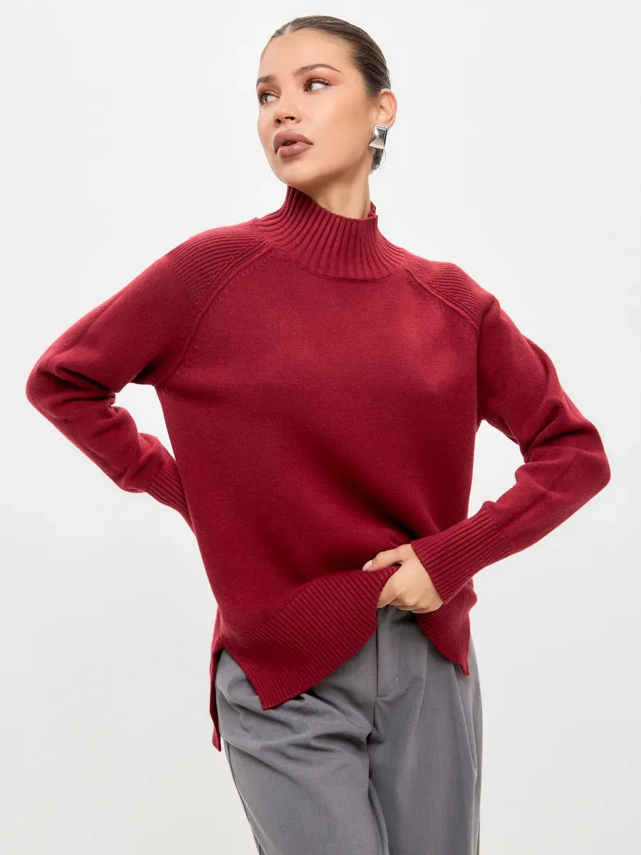 Ruby Sweater by Lauven, luxurious oversized cashmere blend in rich burgundy with high neck and textured shoulder patterns.