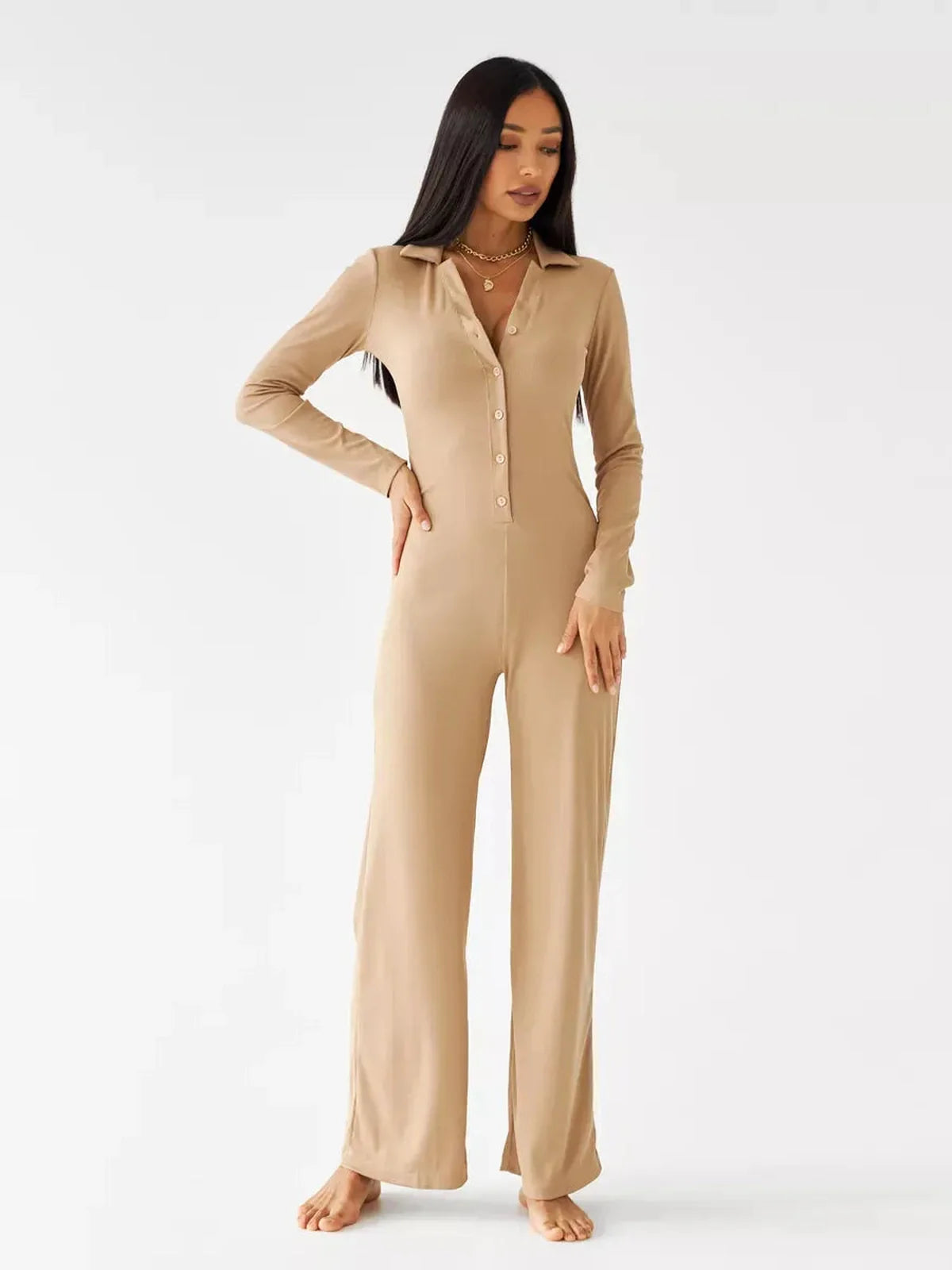Jersey Jumpsuit in sand ribbed knit with button-front and wide-leg silhouette, perfect for lounging and casual outings.