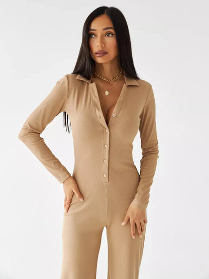Jersey Jumpsuit in sand ribbed knit with button-front and tailored collar, perfect for lounging or casual outings.