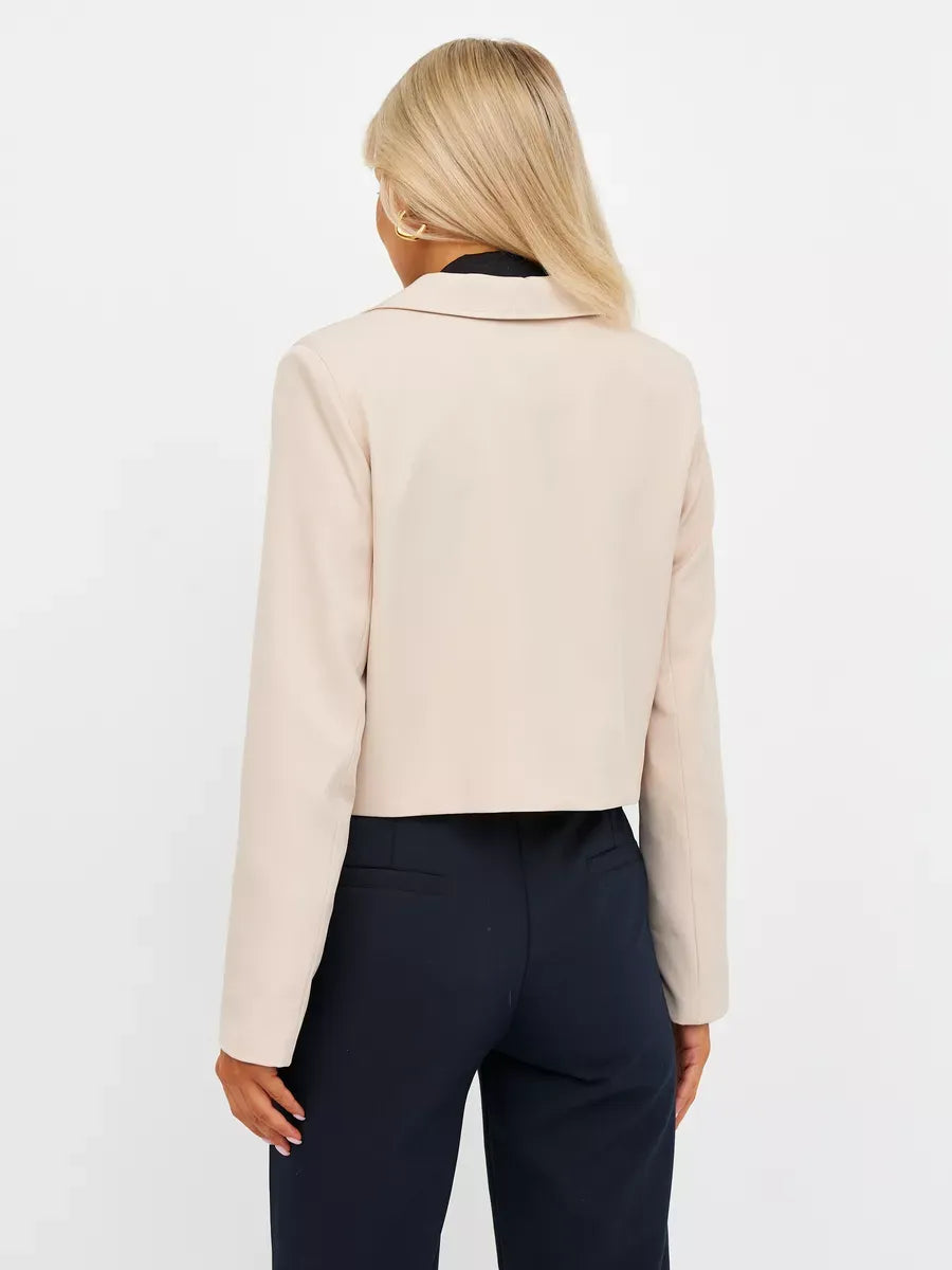 Back view of Lauven Sandstone Blazer, a cropped tailored classic in soft beige.