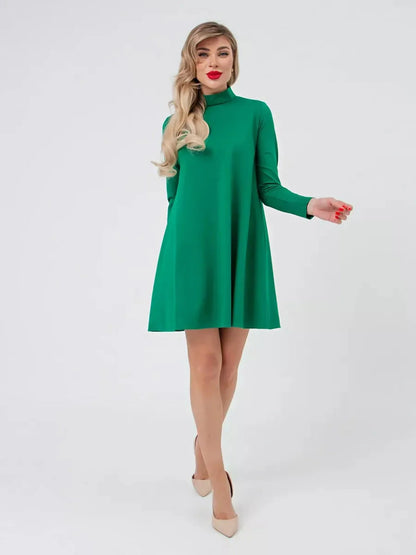 Santorini Mini Dress by Lauven in olive green A-line with stand collar and long sleeves on model.