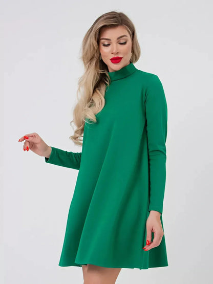 Model wearing a Santorini Mini Dress by Lauven in olive green, showcasing a chic A-line silhouette with a stand collar.