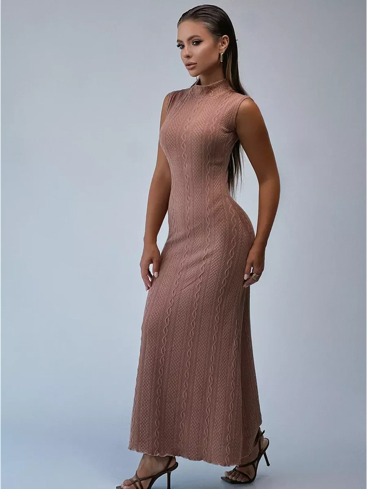 Savannah Maxi Dress by Lauven in cocoa jacquard knit, showcasing a sleeveless bodycon silhouette and intricate cable patterns.