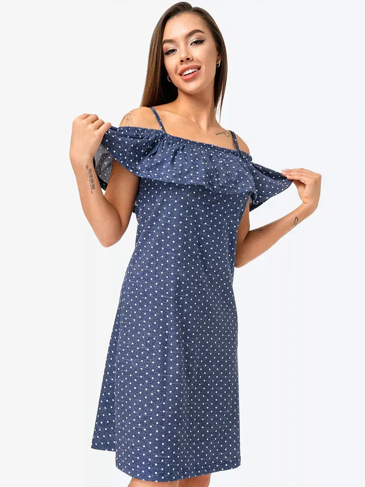 Scarlett Mini Dress by Lauven, featuring a blue polka dot design with off-shoulder ruffles, perfect for warm-weather elegance.