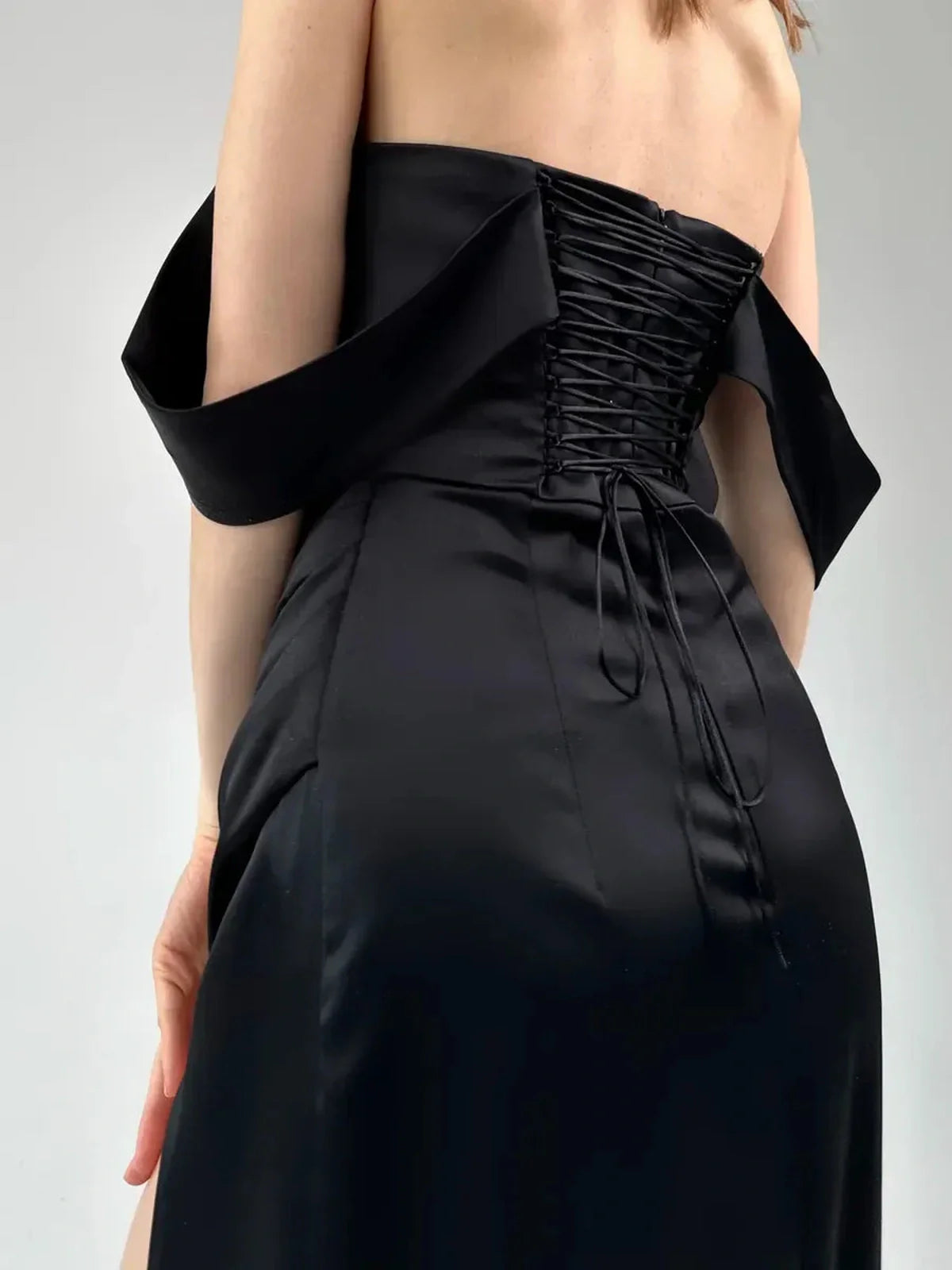 Selene Party Dress by Lauven showcasing off-shoulder satin elegance and lace-up back detail.