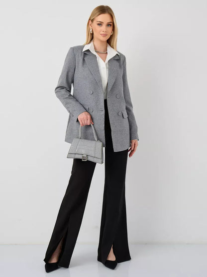 Silverstone Blazer by Lauven; oversized double-breasted gray tailored jacket worn with black pants.