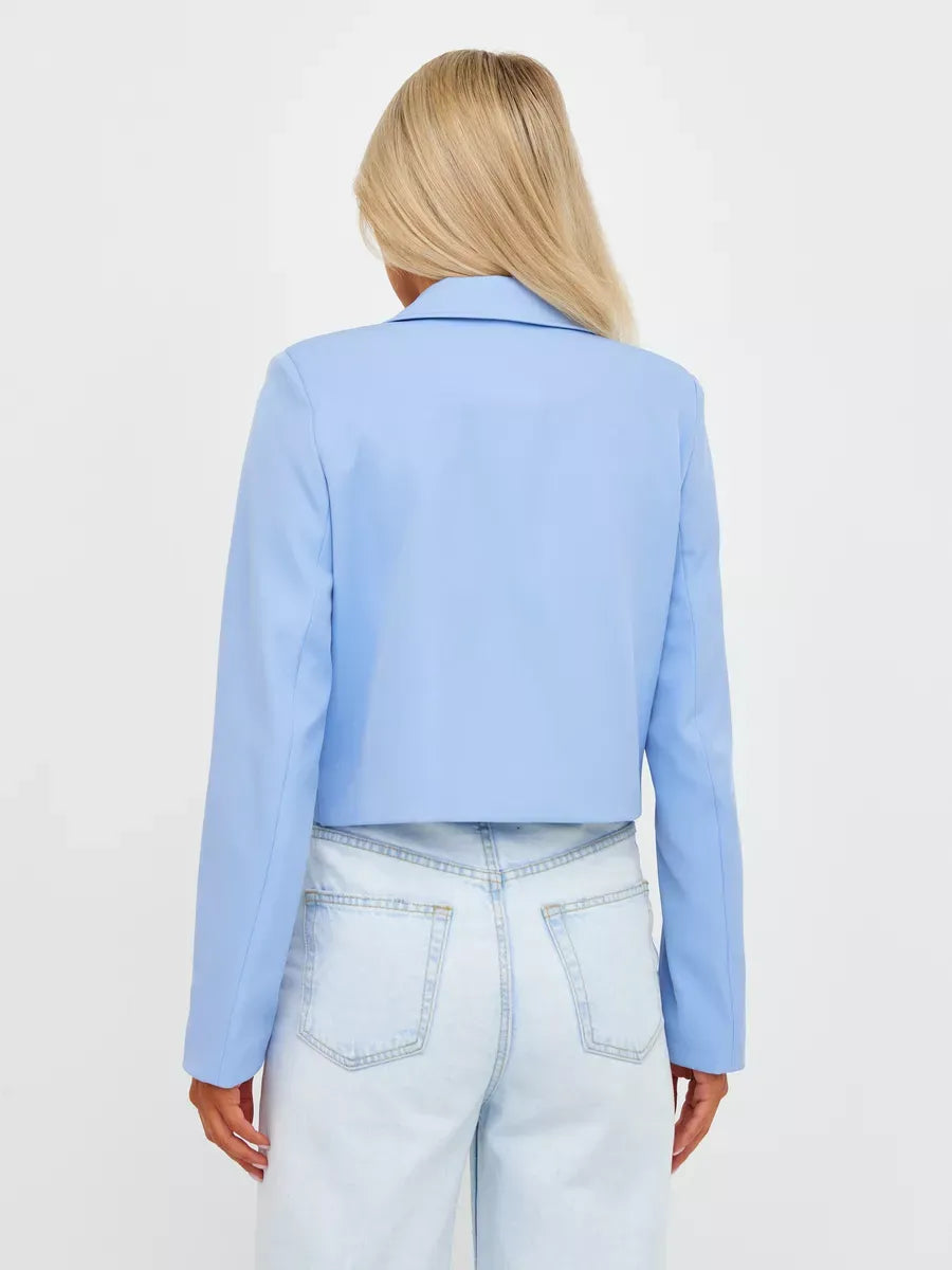 Back view of Skyline Blazer by Lauven, a cropped tailored classic in soft blue.