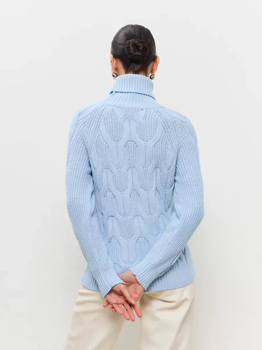 Skyline Knitwear by Lauven - Women’s wool-blend turtleneck sweater in soft pastel blue, showcasing elegant cable-knit design.