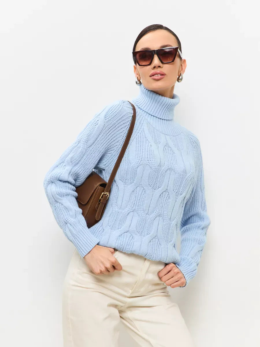 Skyline Knitwear by Lauven - Women's wool-blend turtleneck sweater in soft pastel blue with cable-knit pattern.