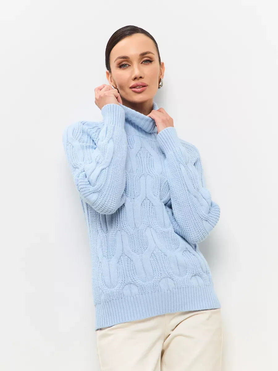 Skyline Knitwear by Lauven: Women's oversized wool-blend turtleneck sweater in soft pastel blue with cable-knit design.