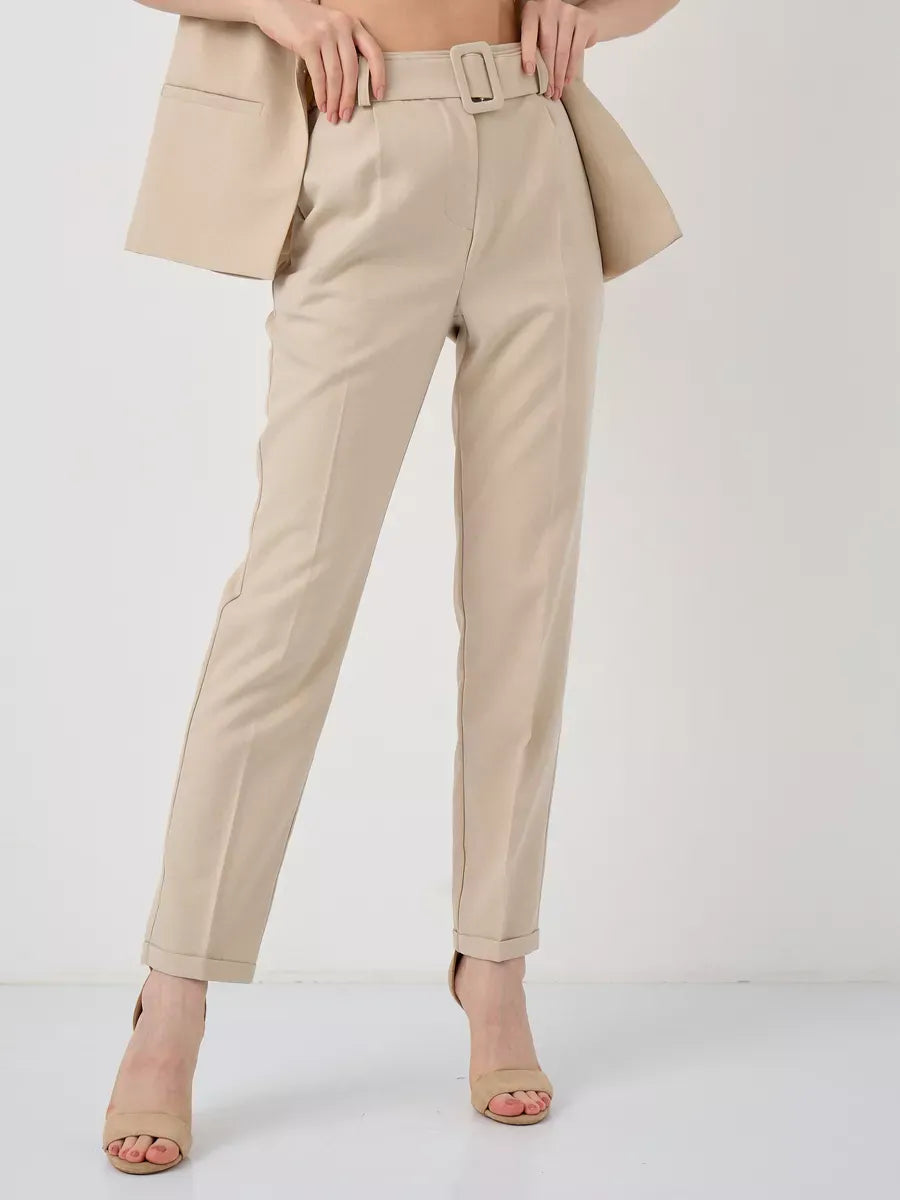 Solara Suit Set by Lauven featuring sleek beige high-waist pants for a stylish and modern look.