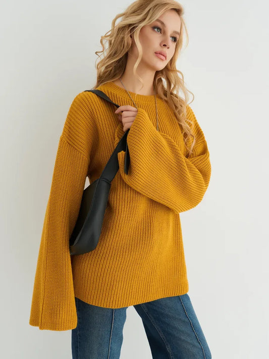 Solara Sweater by Lauven in oversized knit mustard yellow with bell sleeves, perfect for a stylish and cozy look.