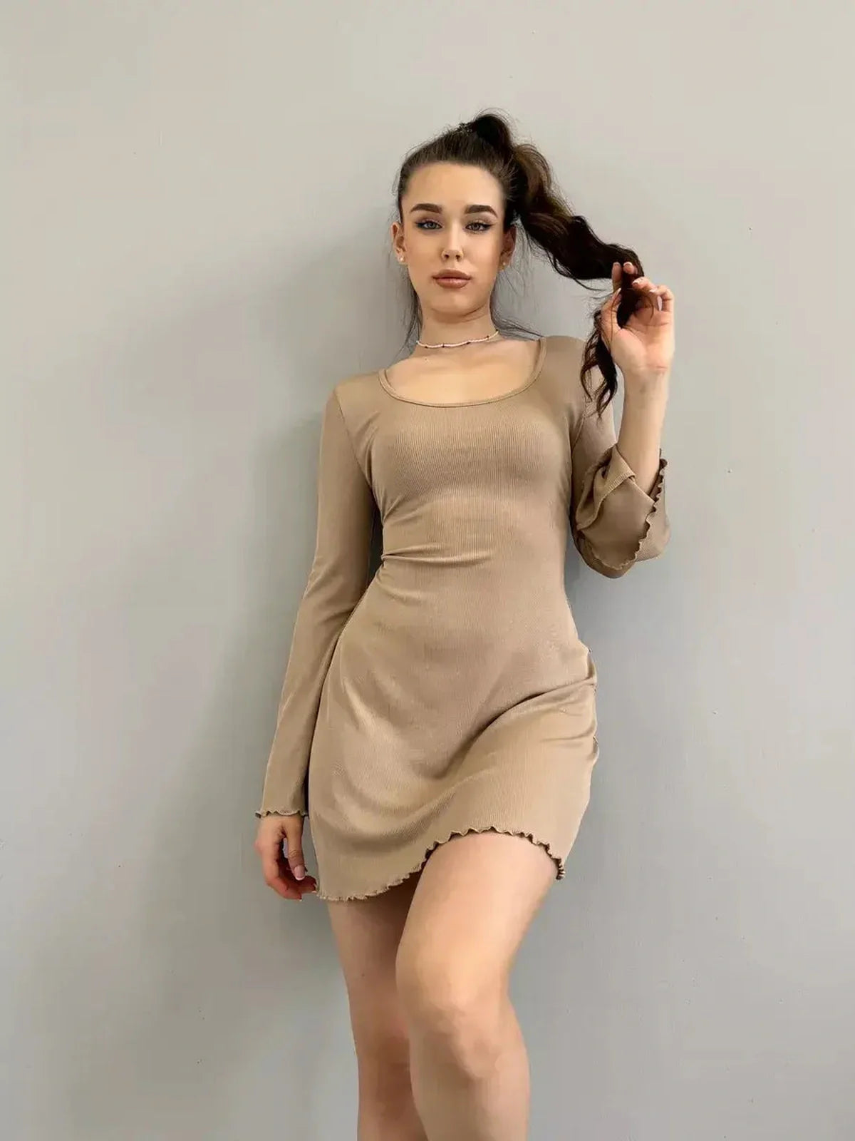 Sophia Mini Dress by Lauven, featuring a neutral ribbed knit design and long sleeves.