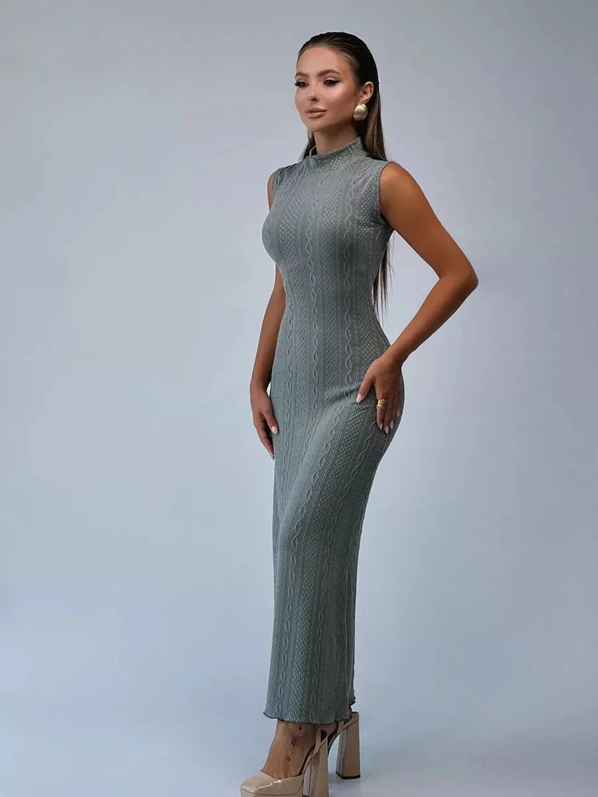 Stella Maxi Dress by Lauven, sleeveless bodycon gown in textured knit, shown on model in gray color.