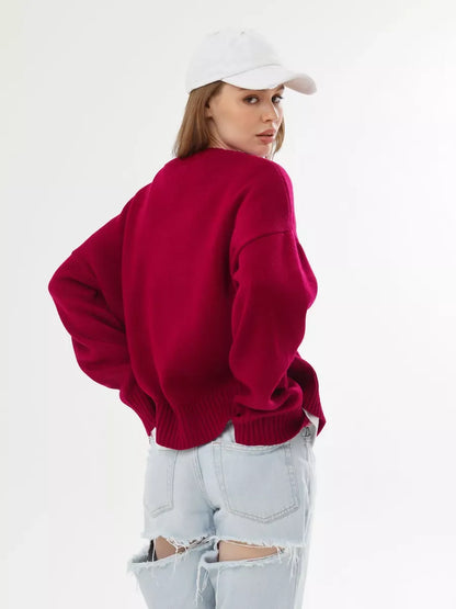 Vela Pullover by Lauven, oversized cropped women's sweater in rich burgundy, styled with denim shorts.