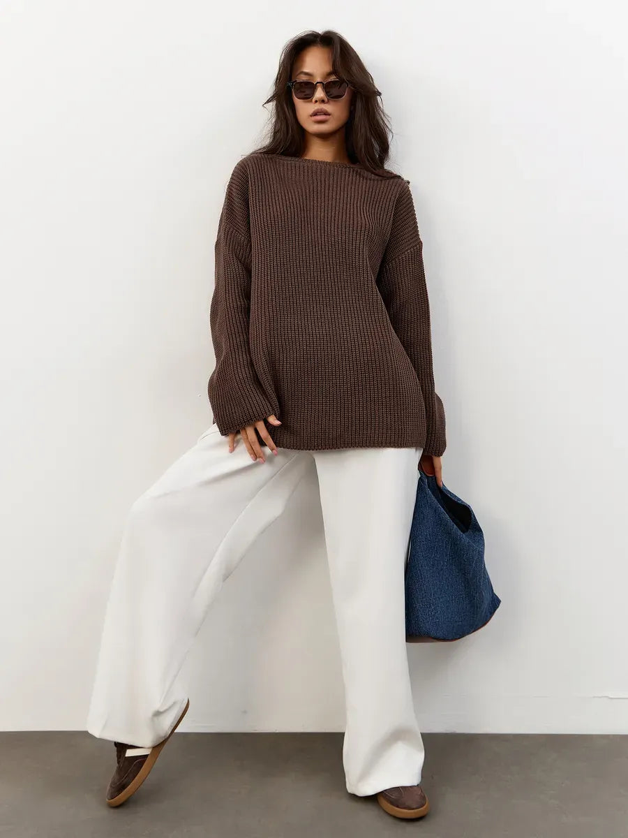 Zara Sweater by Lauven, oversized chocolate brown knit with crew neck, paired with white wide-leg pants.